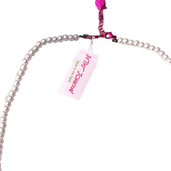 Betsey Johnson Ghost Fringe Pendant Long Necklace
Glow In The Dark White Fuchsia - Picture 3 of 4